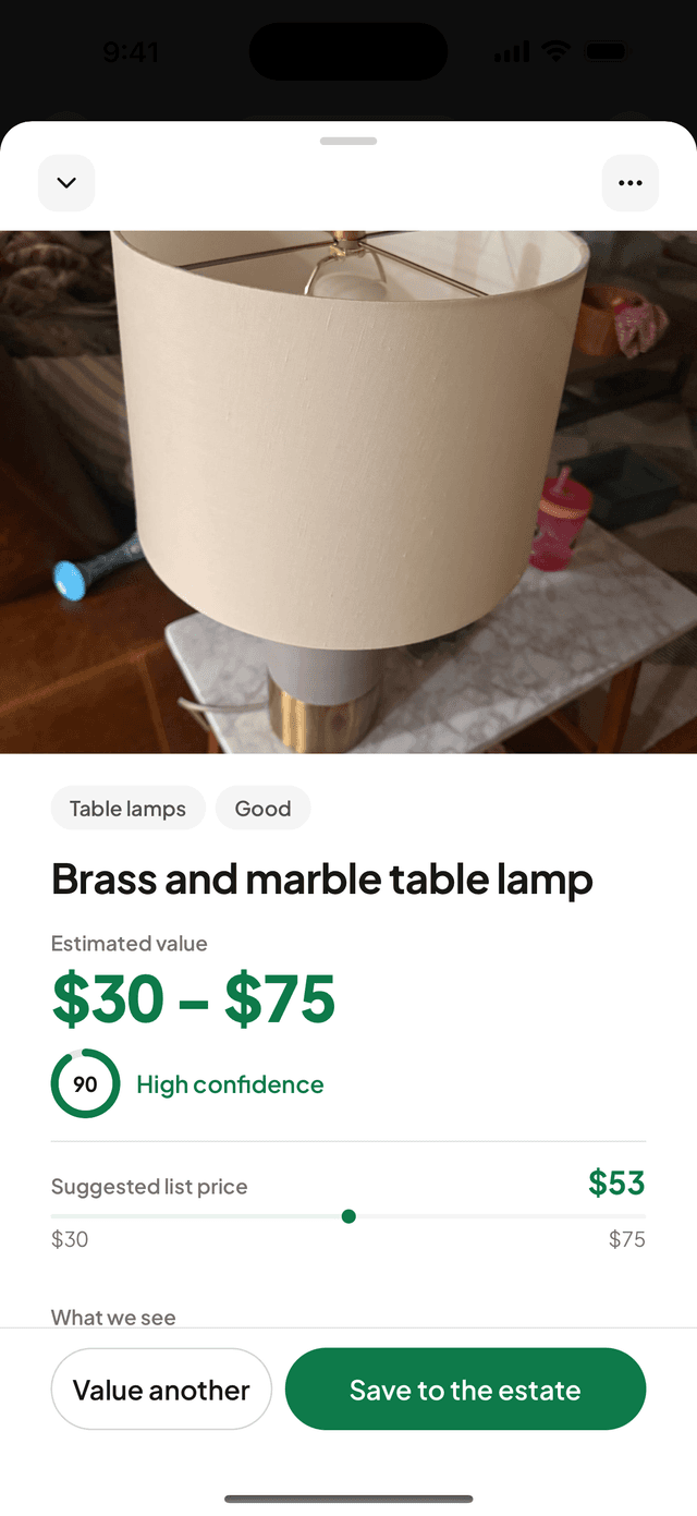 A scanned lamp with its estimated value range and a confidence ring